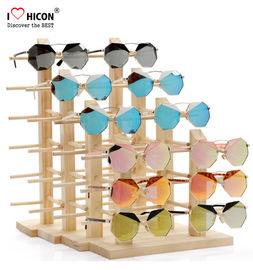 China Erstaunliche Kunden-hölzerne Sonnenbrille-Ausstellungsstand-Gegenspitzen-Werbungs-Ausrüstung fournisseur